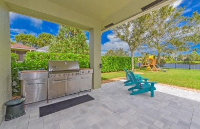 Welcome to this stunning estate home nestled within a premier on Hammock Creek Golf Club in Florida - for sale on GolfHomes.com, golf home, golf lot
