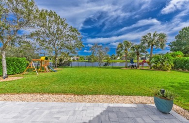 Welcome to this stunning estate home nestled within a premier on Hammock Creek Golf Club in Florida - for sale on GolfHomes.com, golf home, golf lot