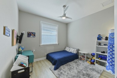 Welcome to this stunning estate home nestled within a premier on Hammock Creek Golf Club in Florida - for sale on GolfHomes.com, golf home, golf lot