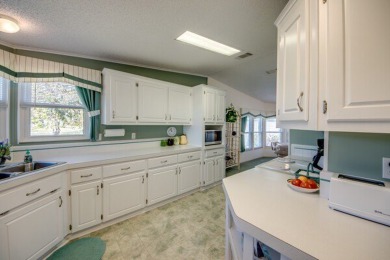 This beautiful 2-bedroom, 2-bathroom home is located in the on Lake Fairways Country Club in Florida - for sale on GolfHomes.com, golf home, golf lot
