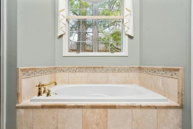 This stately, custom built home rests one of the most beautiful on Stonebridge Golf Club in Michigan - for sale on GolfHomes.com, golf home, golf lot