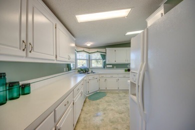 This beautiful 2-bedroom, 2-bathroom home is located in the on Lake Fairways Country Club in Florida - for sale on GolfHomes.com, golf home, golf lot