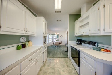 This beautiful 2-bedroom, 2-bathroom home is located in the on Lake Fairways Country Club in Florida - for sale on GolfHomes.com, golf home, golf lot