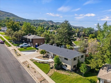 This beautiful home is perched high on the east bench of on Bountiful Ridge Golf Course in Utah - for sale on GolfHomes.com, golf home, golf lot