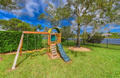 Welcome to this stunning estate home nestled within a premier on Hammock Creek Golf Club in Florida - for sale on GolfHomes.com, golf home, golf lot