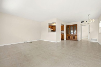 SECOND FLOOR CORNER UNIT WITH GARDEN VIEW ,FRESH PAINTED IN on Kings Point Golf - Executive in Florida - for sale on GolfHomes.com, golf home, golf lot