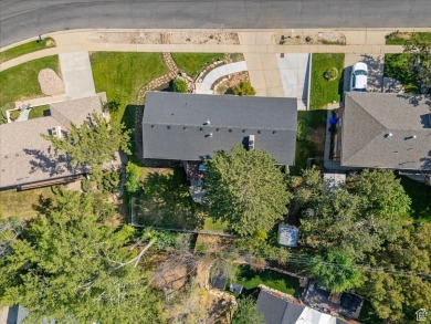 This beautiful home is perched high on the east bench of on Bountiful Ridge Golf Course in Utah - for sale on GolfHomes.com, golf home, golf lot