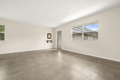 SECOND FLOOR CORNER UNIT WITH GARDEN VIEW ,FRESH PAINTED IN on Kings Point Golf - Executive in Florida - for sale on GolfHomes.com, golf home, golf lot
