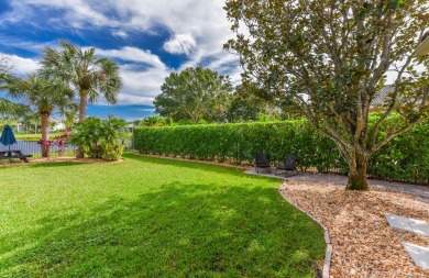Welcome to this stunning estate home nestled within a premier on Hammock Creek Golf Club in Florida - for sale on GolfHomes.com, golf home, golf lot