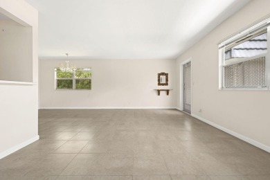 SECOND FLOOR CORNER UNIT WITH GARDEN VIEW ,FRESH PAINTED IN on Kings Point Golf - Executive in Florida - for sale on GolfHomes.com, golf home, golf lot
