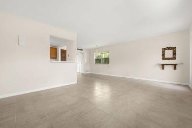SECOND FLOOR CORNER UNIT WITH GARDEN VIEW ,FRESH PAINTED IN on Kings Point Golf - Executive in Florida - for sale on GolfHomes.com, golf home, golf lot