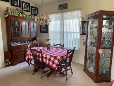 This charming 2-bedroom, 2-bath home is situated in the on Twisted Oaks Golf Club in Florida - for sale on GolfHomes.com, golf home, golf lot