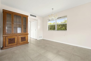 SECOND FLOOR CORNER UNIT WITH GARDEN VIEW ,FRESH PAINTED IN on Kings Point Golf - Executive in Florida - for sale on GolfHomes.com, golf home, golf lot