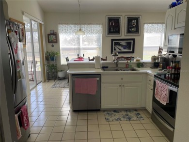 This charming 2-bedroom, 2-bath home is situated in the on Twisted Oaks Golf Club in Florida - for sale on GolfHomes.com, golf home, golf lot