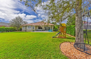 Welcome to this stunning estate home nestled within a premier on Hammock Creek Golf Club in Florida - for sale on GolfHomes.com, golf home, golf lot