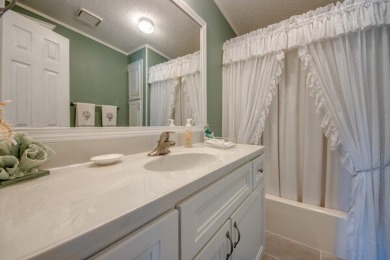 This beautiful 2-bedroom, 2-bathroom home is located in the on Lake Fairways Country Club in Florida - for sale on GolfHomes.com, golf home, golf lot