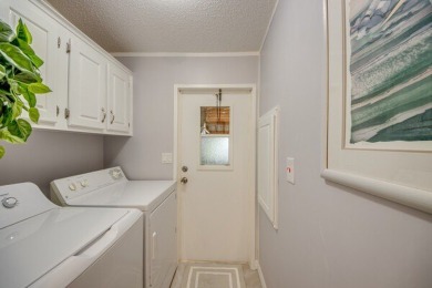 This beautiful 2-bedroom, 2-bathroom home is located in the on Lake Fairways Country Club in Florida - for sale on GolfHomes.com, golf home, golf lot