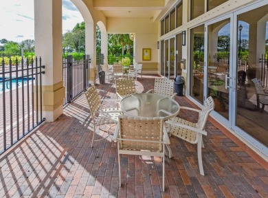 Welcome to this stunning estate home nestled within a premier on Hammock Creek Golf Club in Florida - for sale on GolfHomes.com, golf home, golf lot