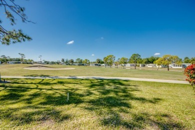 This beautiful 2-bedroom, 2-bathroom home is located in the on Lake Fairways Country Club in Florida - for sale on GolfHomes.com, golf home, golf lot