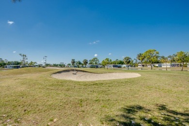 This beautiful 2-bedroom, 2-bathroom home is located in the on Lake Fairways Country Club in Florida - for sale on GolfHomes.com, golf home, golf lot