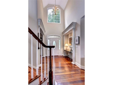 This perfectly designed home sits majestically on the hill in on Fords Colony Country Club in Virginia - for sale on GolfHomes.com, golf home, golf lot