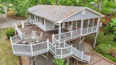 This cozy 2-bedroom, 2-bath home offers the perfect blend of on River Golf and County Club at Lake Royale in North Carolina - for sale on GolfHomes.com, golf home, golf lot
