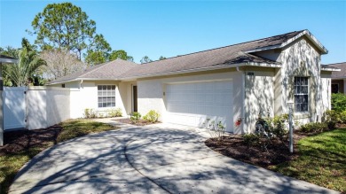 Fantastic views overlooking the golf course in guard gated 55+ on Kings Ridge Golf Club in Florida - for sale on GolfHomes.com, golf home, golf lot