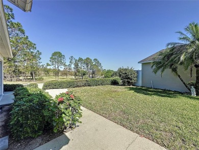 Fantastic views overlooking the golf course in guard gated 55+ on Kings Ridge Golf Club in Florida - for sale on GolfHomes.com, golf home, golf lot