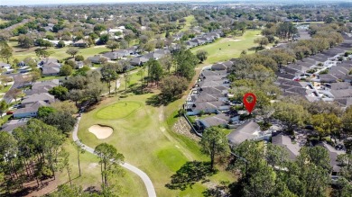 Fantastic views overlooking the golf course in guard gated 55+ on Kings Ridge Golf Club in Florida - for sale on GolfHomes.com, golf home, golf lot