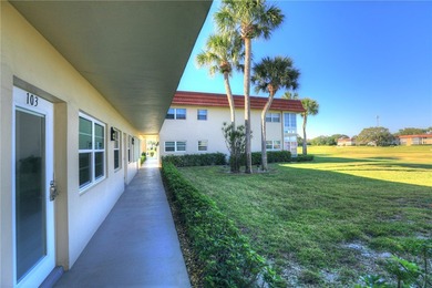 Charming first-floor condo with golf and green space views plus on The American Golf Club in Florida - for sale on GolfHomes.com, golf home, golf lot