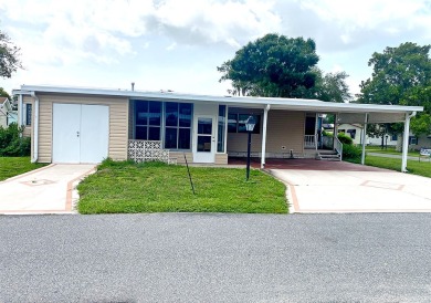 A corner lot home in a well-maintained, professionally managed on Lakes at Leesburg Golf Course in Florida - for sale on GolfHomes.com, golf home, golf lot