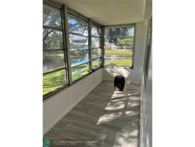 This is one of the best buildings in CVE. This corner unit with on Hillsboro Pines Golf in Florida - for sale on GolfHomes.com, golf home, golf lot