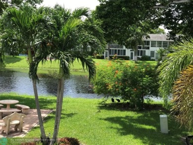 This is one of the best buildings in CVE. This corner unit with on Hillsboro Pines Golf in Florida - for sale on GolfHomes.com, golf home, golf lot