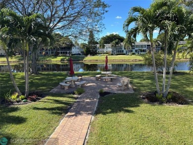 This is one of the best buildings in CVE. This corner unit with on Hillsboro Pines Golf in Florida - for sale on GolfHomes.com, golf home, golf lot