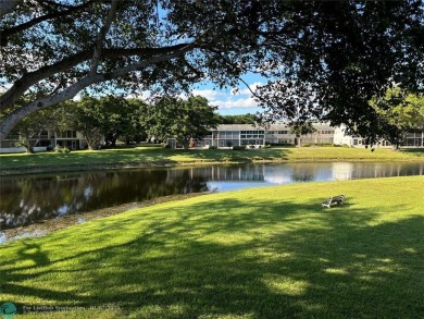 This is one of the best buildings in CVE. This corner unit with on Hillsboro Pines Golf in Florida - for sale on GolfHomes.com, golf home, golf lot