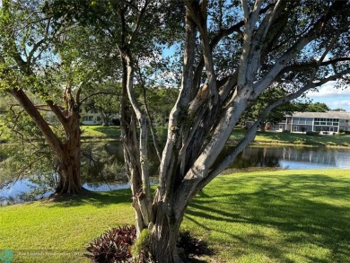 This is one of the best buildings in CVE. This corner unit with on Hillsboro Pines Golf in Florida - for sale on GolfHomes.com, golf home, golf lot