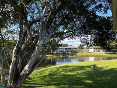 This is one of the best buildings in CVE. This corner unit with on Hillsboro Pines Golf in Florida - for sale on GolfHomes.com, golf home, golf lot