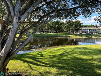 This is one of the best buildings in CVE. This corner unit with on Hillsboro Pines Golf in Florida - for sale on GolfHomes.com, golf home, golf lot