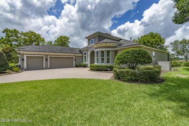 LUXURY LIFESTYLE! Indulge in a captivating pool home centrally on Golf Club At North Hampton in Florida - for sale on GolfHomes.com, golf home, golf lot