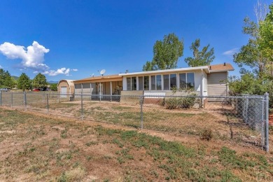 Don't miss out on this well-maintained home located in beautiful on Hollydot Golf Course in Colorado - for sale on GolfHomes.com, golf home, golf lot