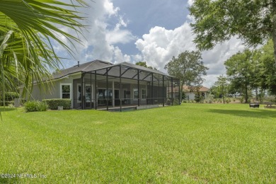 LUXURY LIFESTYLE! Indulge in a captivating pool home centrally on Golf Club At North Hampton in Florida - for sale on GolfHomes.com, golf home, golf lot