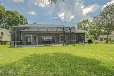 LUXURY LIFESTYLE! Indulge in a captivating pool home centrally on Golf Club At North Hampton in Florida - for sale on GolfHomes.com, golf home, golf lot