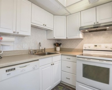 Pristine 2-bedroom, 2-bathroom condo in all-ages Palm Aire on Palm-Aire Country Club and Resort - Palms in Florida - for sale on GolfHomes.com, golf home, golf lot