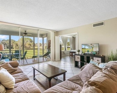 Pristine 2-bedroom, 2-bathroom condo in all-ages Palm Aire on Palm-Aire Country Club and Resort - Palms in Florida - for sale on GolfHomes.com, golf home, golf lot