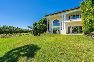 Exquisite 4b/5.5b estate with a separate guest house overlooks on Deering Bay Yacht and Country Club in Florida - for sale on GolfHomes.com, golf home, golf lot