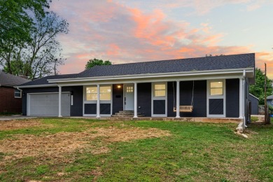 This stunning 4-bedroom, 2-bath home has been completely rebuilt on Horton Smith Golf Course in Missouri - for sale on GolfHomes.com, golf home, golf lot