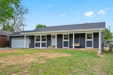 This stunning 4-bedroom, 2-bath home has been completely rebuilt on Horton Smith Golf Course in Missouri - for sale on GolfHomes.com, golf home, golf lot