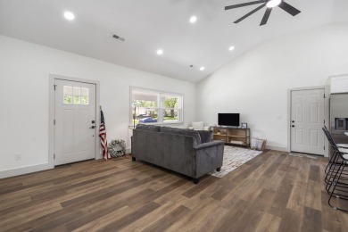 This stunning 4-bedroom, 2-bath home has been completely rebuilt on Horton Smith Golf Course in Missouri - for sale on GolfHomes.com, golf home, golf lot