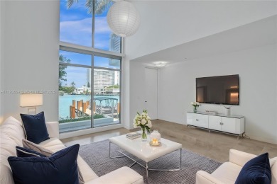 MOTIVATED SELLER!! Rare Bayfront Townhome with 30ft Boat Dock in on Normandy Shores Golf Course in Florida - for sale on GolfHomes.com, golf home, golf lot