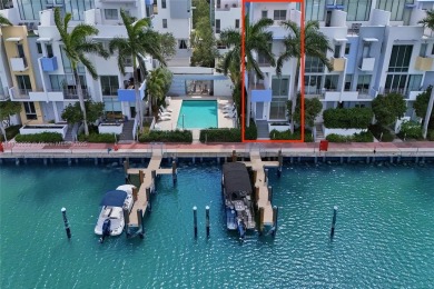 MOTIVATED SELLER!! Rare Bayfront Townhome with 30ft Boat Dock in on Normandy Shores Golf Course in Florida - for sale on GolfHomes.com, golf home, golf lot